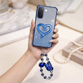 Vivo V60e 5G Luxury Shimmer Airbag Heart Stand Case with Charm Strap